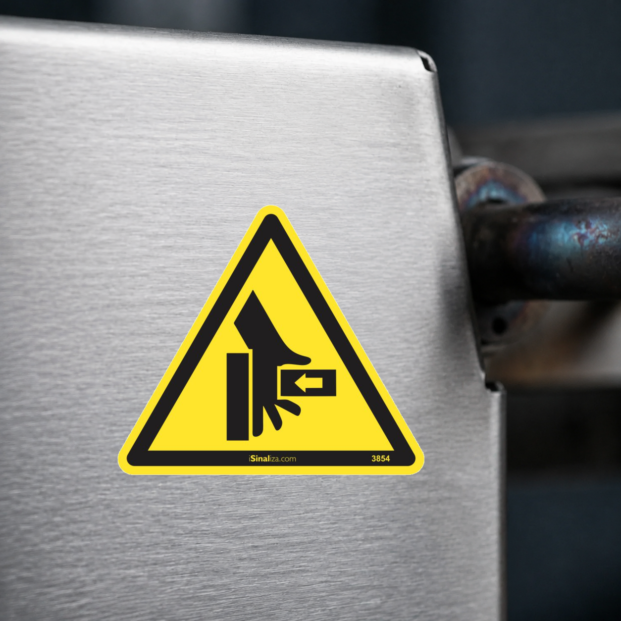 Close-up de etiqueta aplicada em máquina ou equipamento industrial (até 8 × 8 cm) - Etiqueta de Segurança "Esmagamento de Mão - Força Lateral" - (Embalagem com 10 unidades)