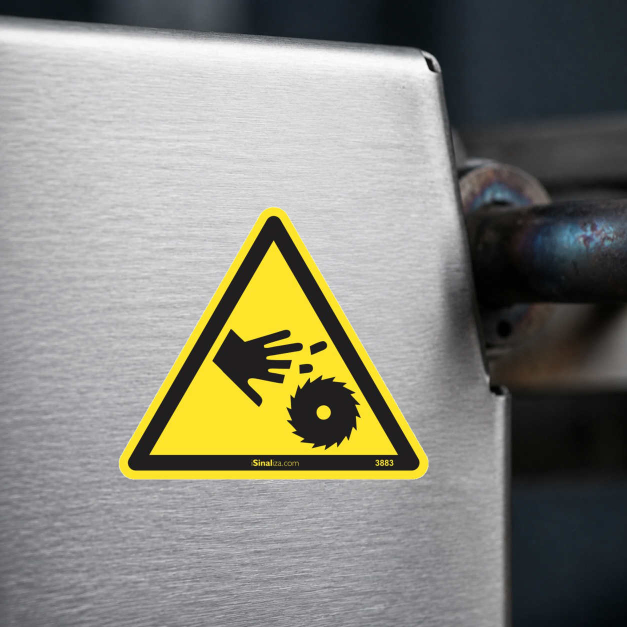 Close-up de etiqueta aplicada em máquina ou equipamento industrial (até 8 × 8 cm) - Etiqueta de Segurança "Risco de Corte por Lâmina Rotativa" - (Embalagem com 10 unidades)